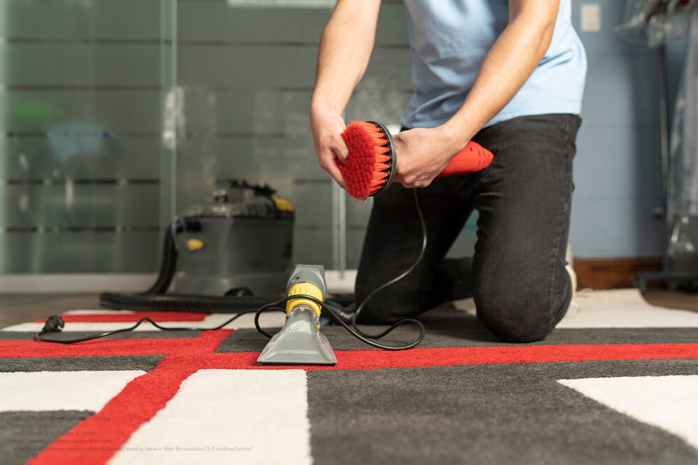 Unrecognizable Laundry Personnel Cleaning Carpet With Special Equipment